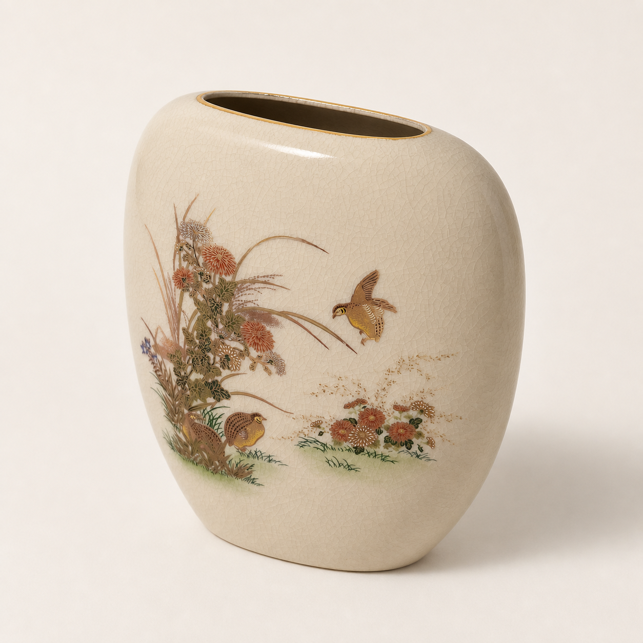 Japanese crackle glaze bird and floral vessel, angled inspection view on white