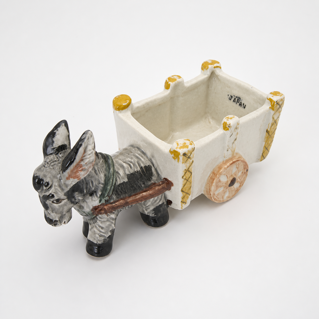 Vintage Japanese ceramic donkey cart planter, elevated inspection view showing Japan mark