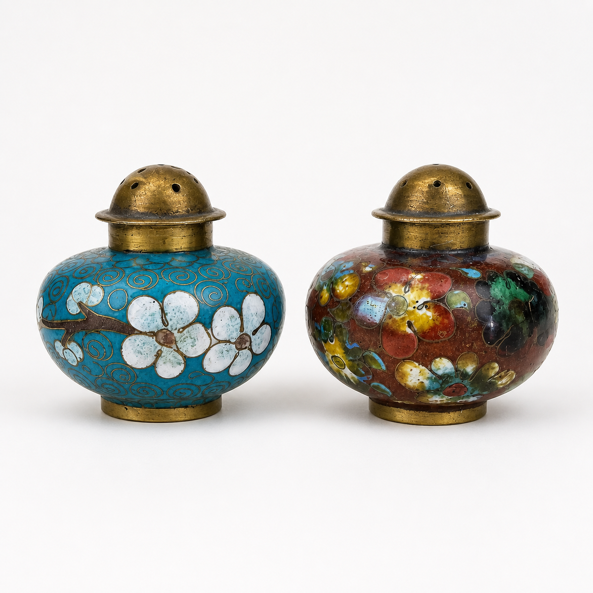 Front inspection view of vintage cloisonné spice shaker pair